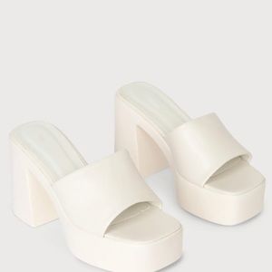 Cream platform slip on sandals